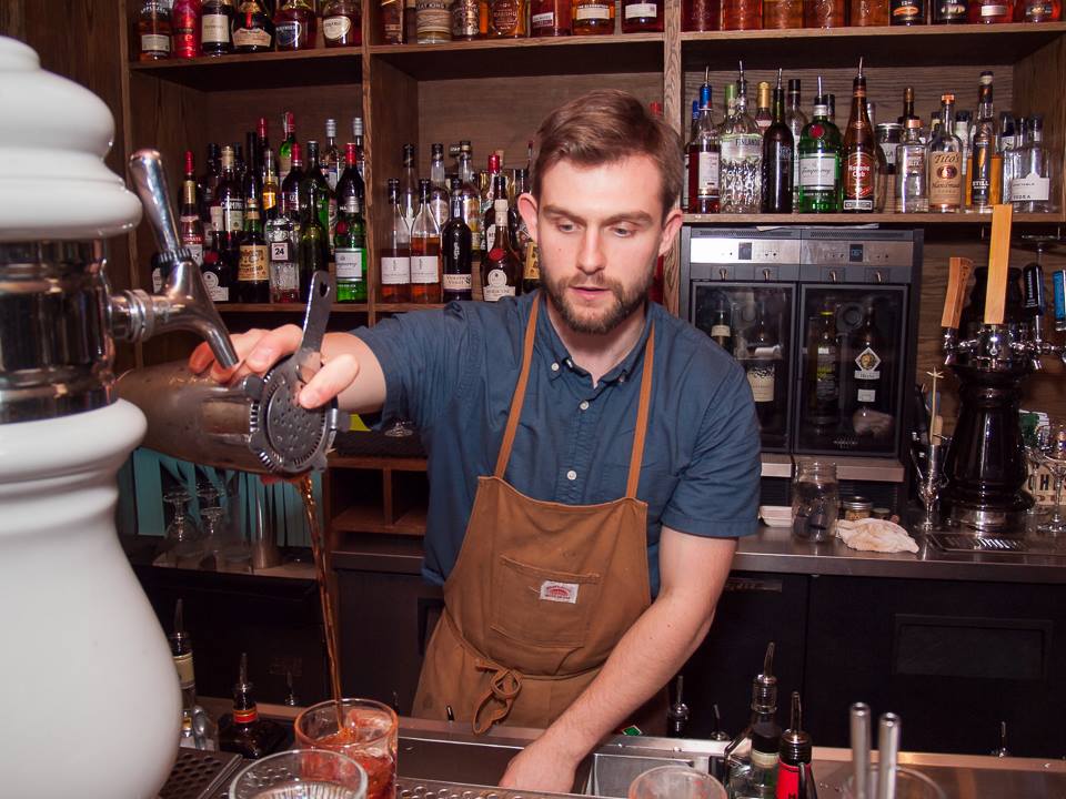 Kyle Guilfoyle bartending at Little Jumbo in 2014